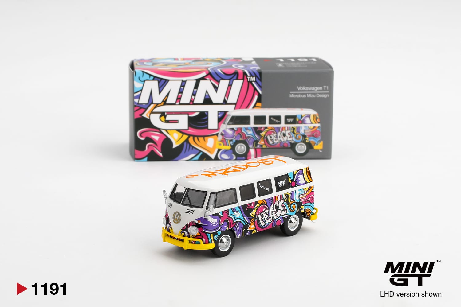 Miniatura Mini GT da Volkswagen T1 Microbus Mizu Design (MGT01191) ao lado da caixa, com pintura grafite colorida e a palavra Peace